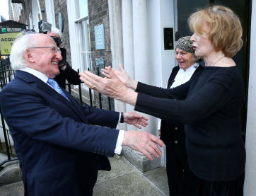 The President of Ireland, Michael D. Higgins is welcomed at the Arts Council offices by visual artist Imogen Stuart and writer Edna O’Brien.