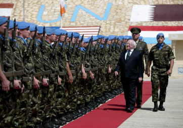 President Michael D Higgins during an Inspection of the Captains Guard of Honour during his visit to the FINIRISH BATT HQ in South Lebanon