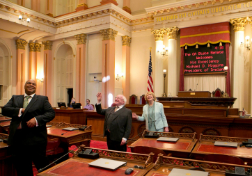 President Higgins and Sabina Higgins are pictured with Brandon Jackson during a visit the State Senate, Sacramento.