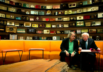 President Higgins is pictured in The Chihuly Boathouse, Seattle with Dale Chihuly, Glassmaker and owner of Chihuly Workshop and Boathouse.