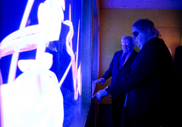 President Higgins is pictured in The Chihuly Boathouse, Seattle with Dale Chihuly, Glassmaker and owner of Chihuly Workshop and Boathouse.